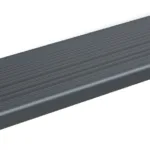 Dark gray metal stair nosing with horizontal grooves and a right-angled lip designed for edge protection and slip resistance.